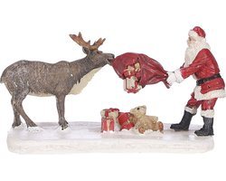 LuVille Kerstdorp Miniatuur Rendier die Kerstman Plaagt - L12 x B7,5 x H7 cm